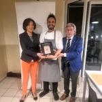 consegna della vetrofania e del libro della Delegazione.